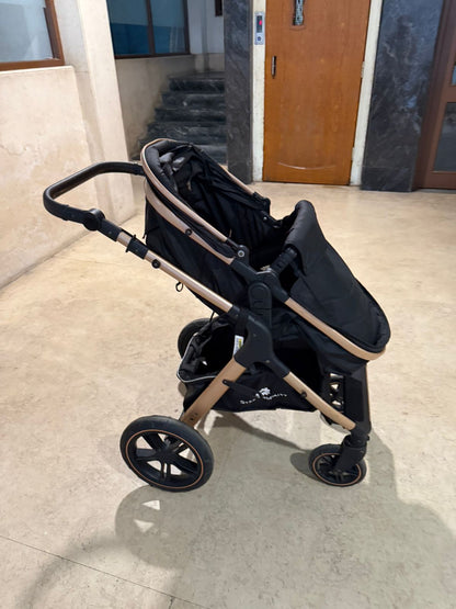 StarAndDaisy EasyGo Premium Baby Strollers Prams with Reversible Bassinet Design, High Landscape Seat, One-push Folding, Powerful Shock Absorption Wheels (Black with Golden Tubes)