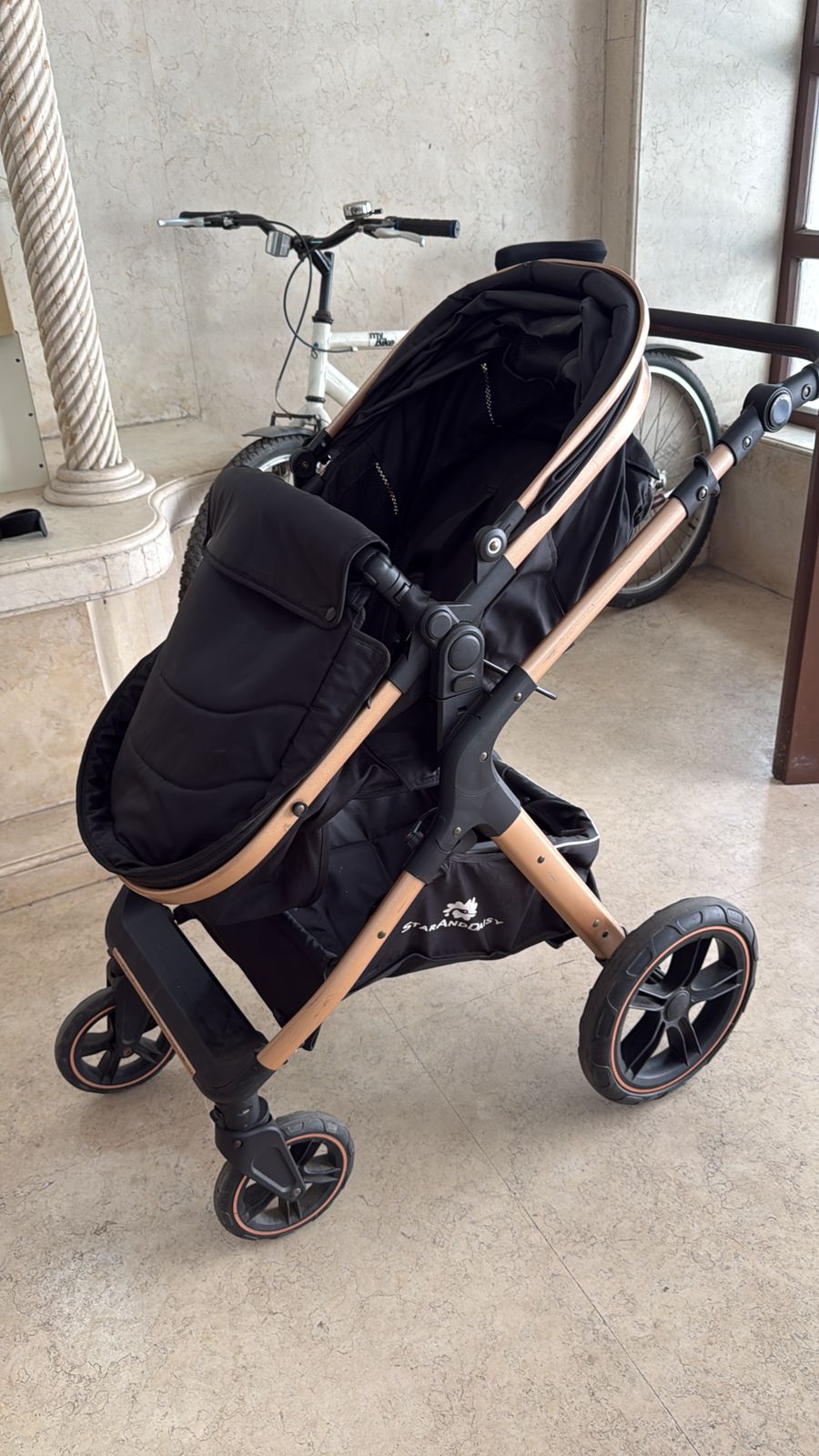 StarAndDaisy EasyGo Premium Baby Strollers Prams with Reversible Bassinet Design, High Landscape Seat, One-push Folding, Powerful Shock Absorption Wheels (Black with Golden Tubes)